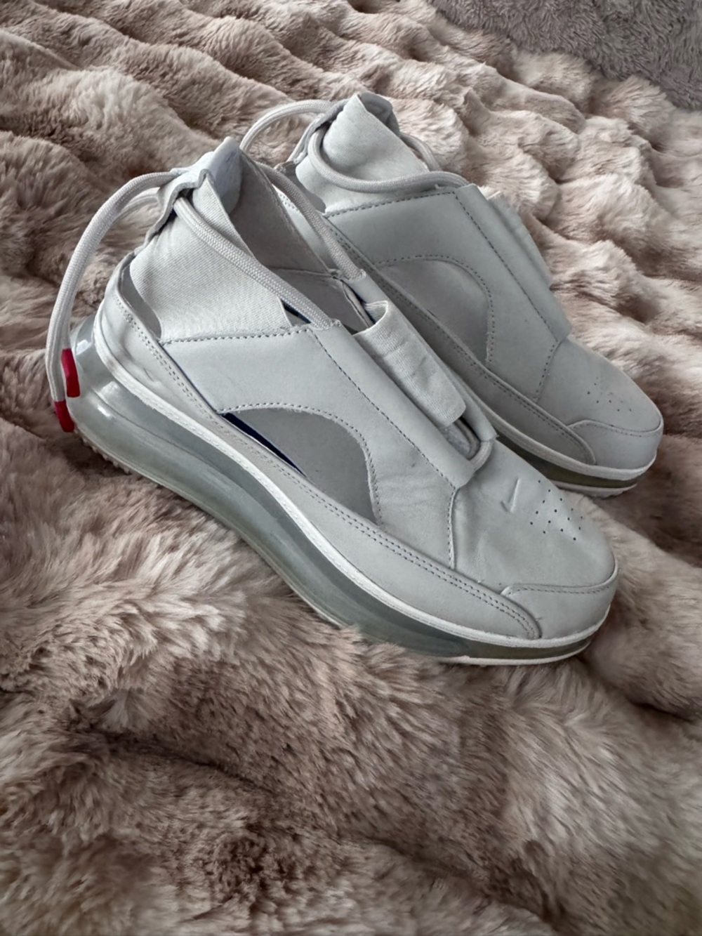 Nike White Slip-On Sneakers with Black Swoosh